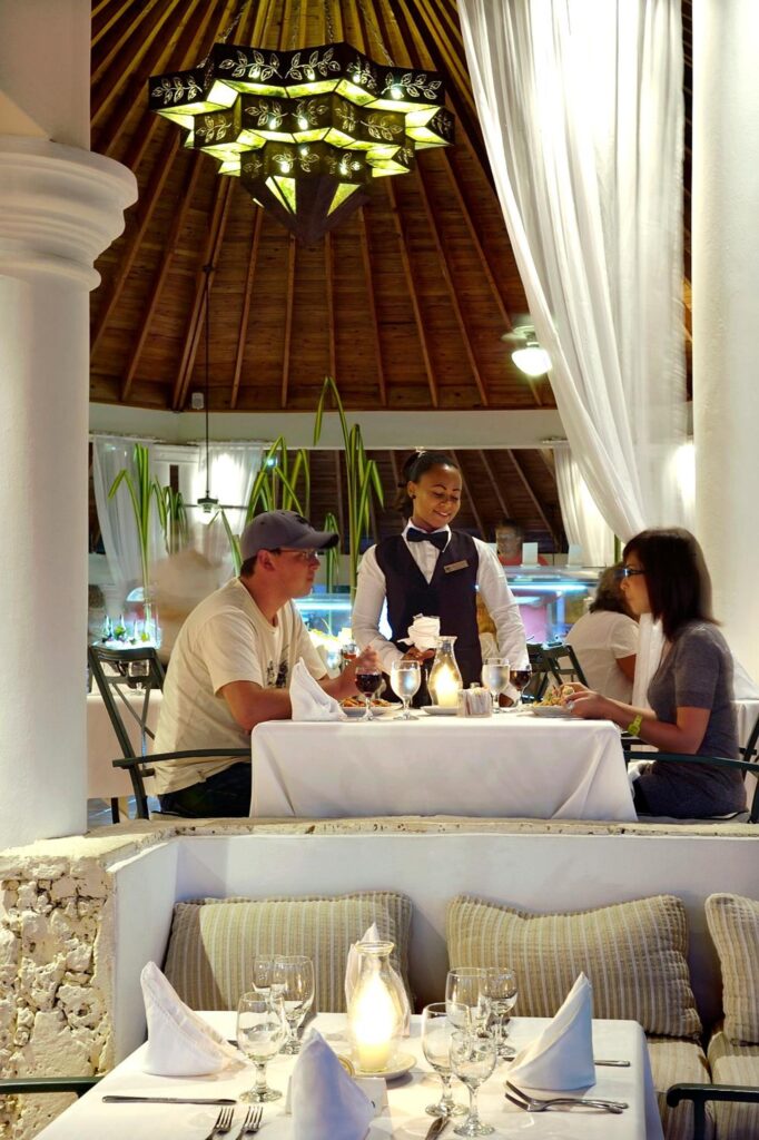 Couple taking dinner at one of the restaurants of Aereal View of Lyfestyle Tropical Resort and Spa